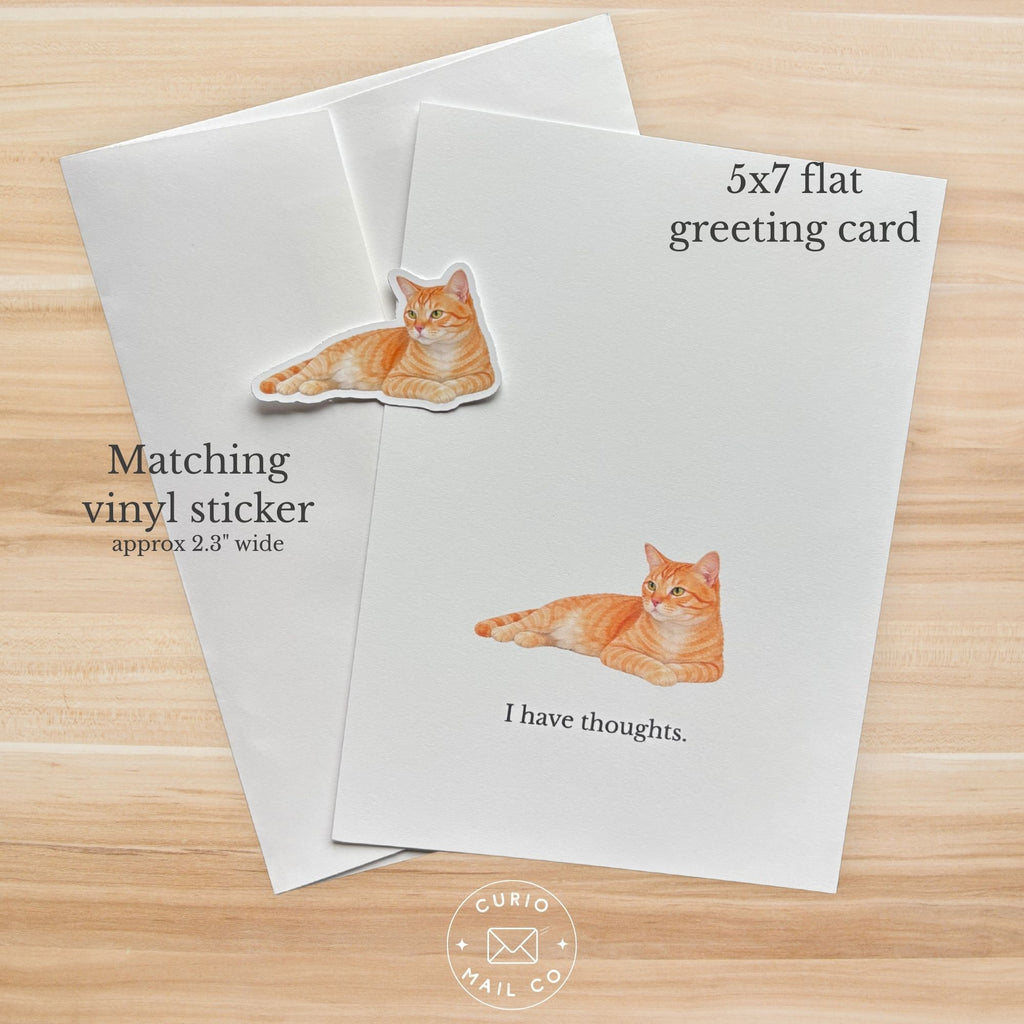 5x7 flat greeting card with matching vinyl sticker of a cat on a wooden surface.