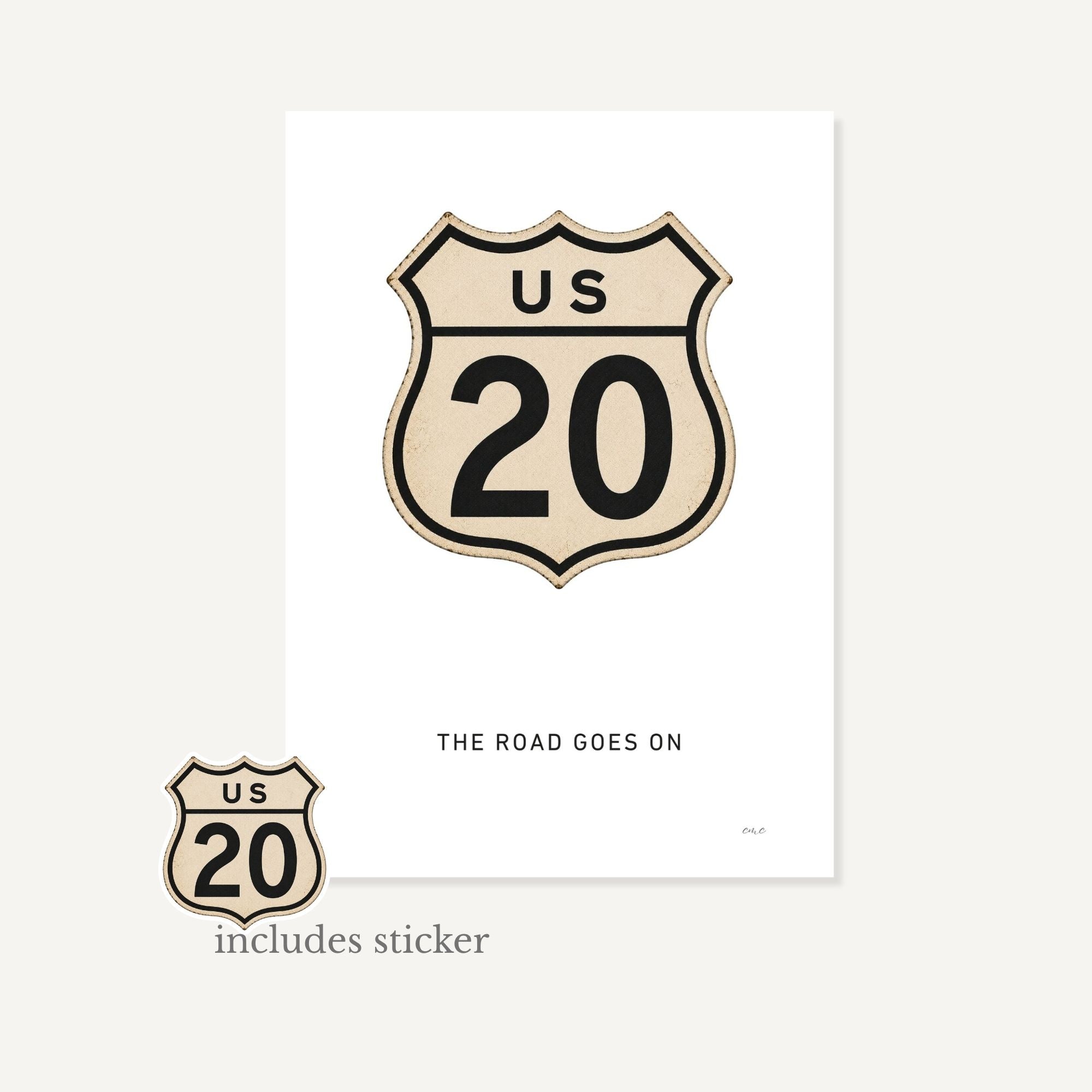 US Route 20 sign design on a white background with text 'The Road Goes On' and 'includes sticker'.