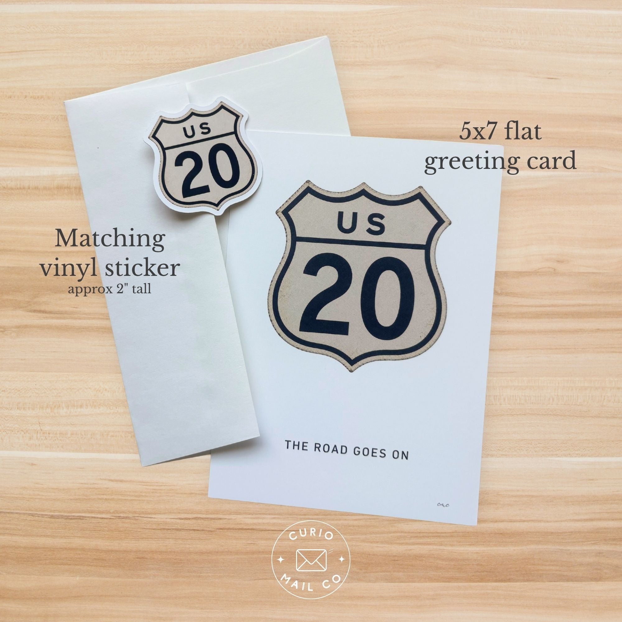 5x7 flat greeting card with matching vinyl sticker on a wooden surface, featuring 'US 20' design.