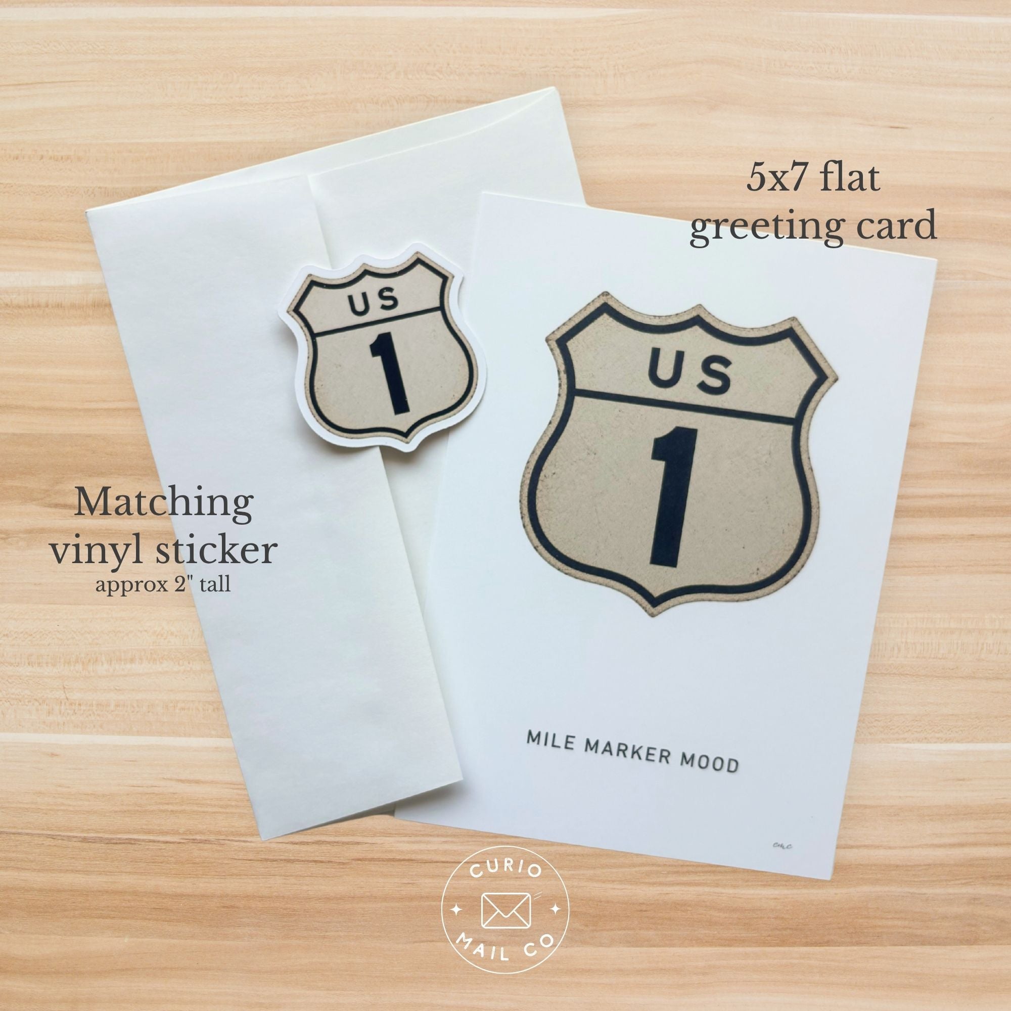 5x7 flat greeting card with matching vinyl sticker on a wooden surface, featuring 'US 1' design.