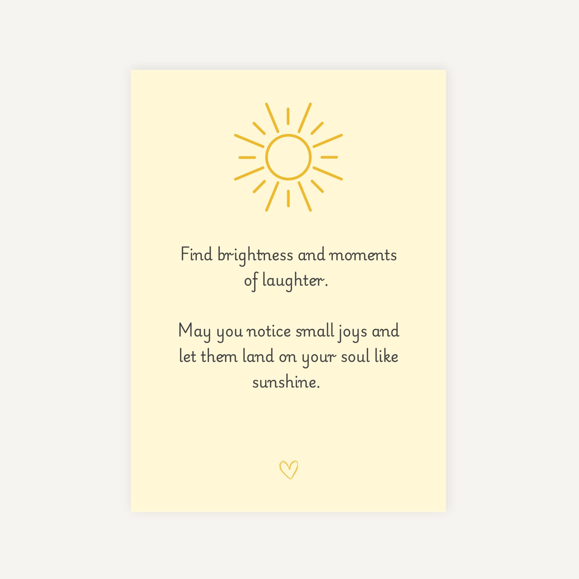 Motivational card with sun illustration and inspirational quote on a light yellow background