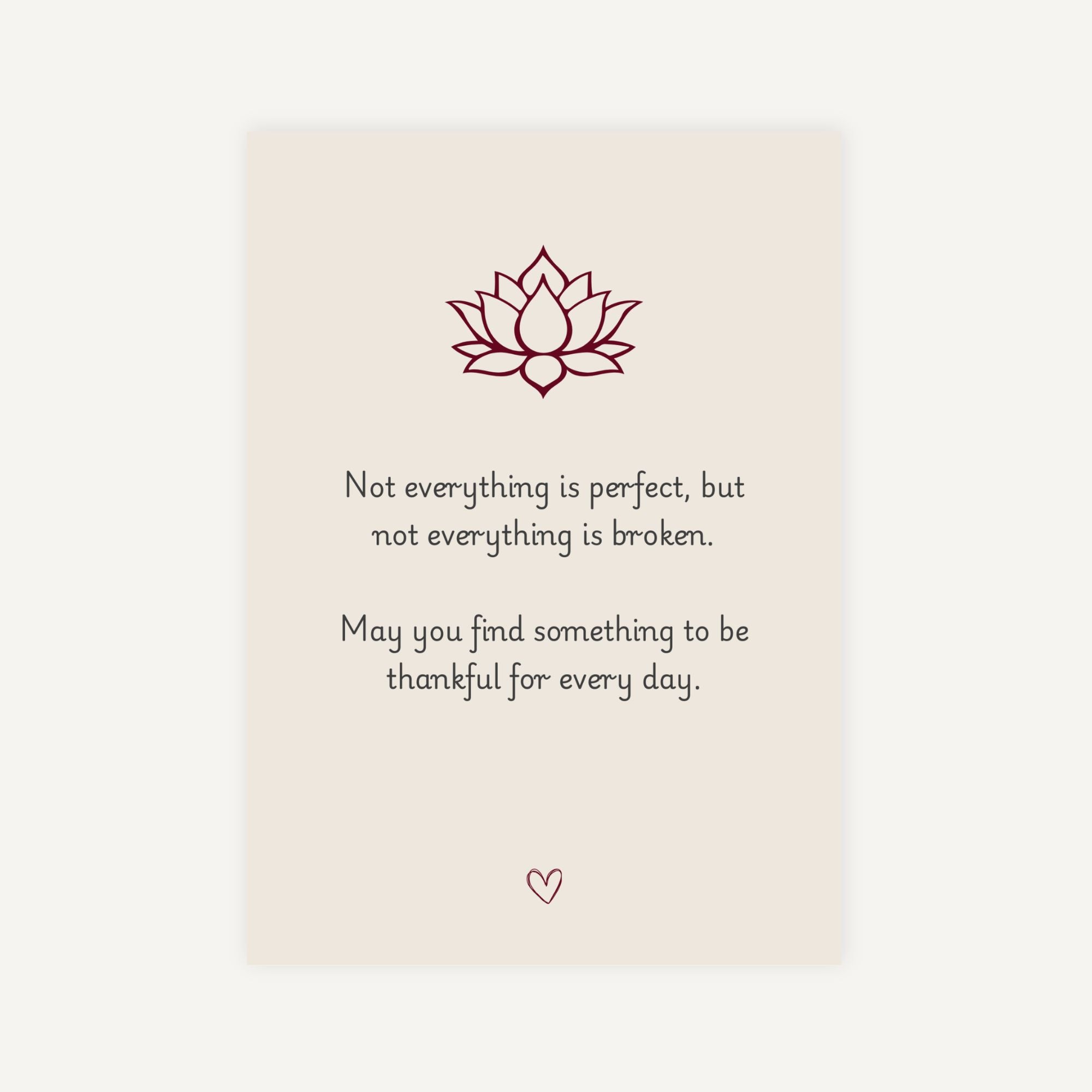 Motivational quote with lotus flower on a beige background