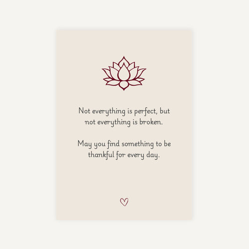 Motivational quote with lotus flower on a beige background