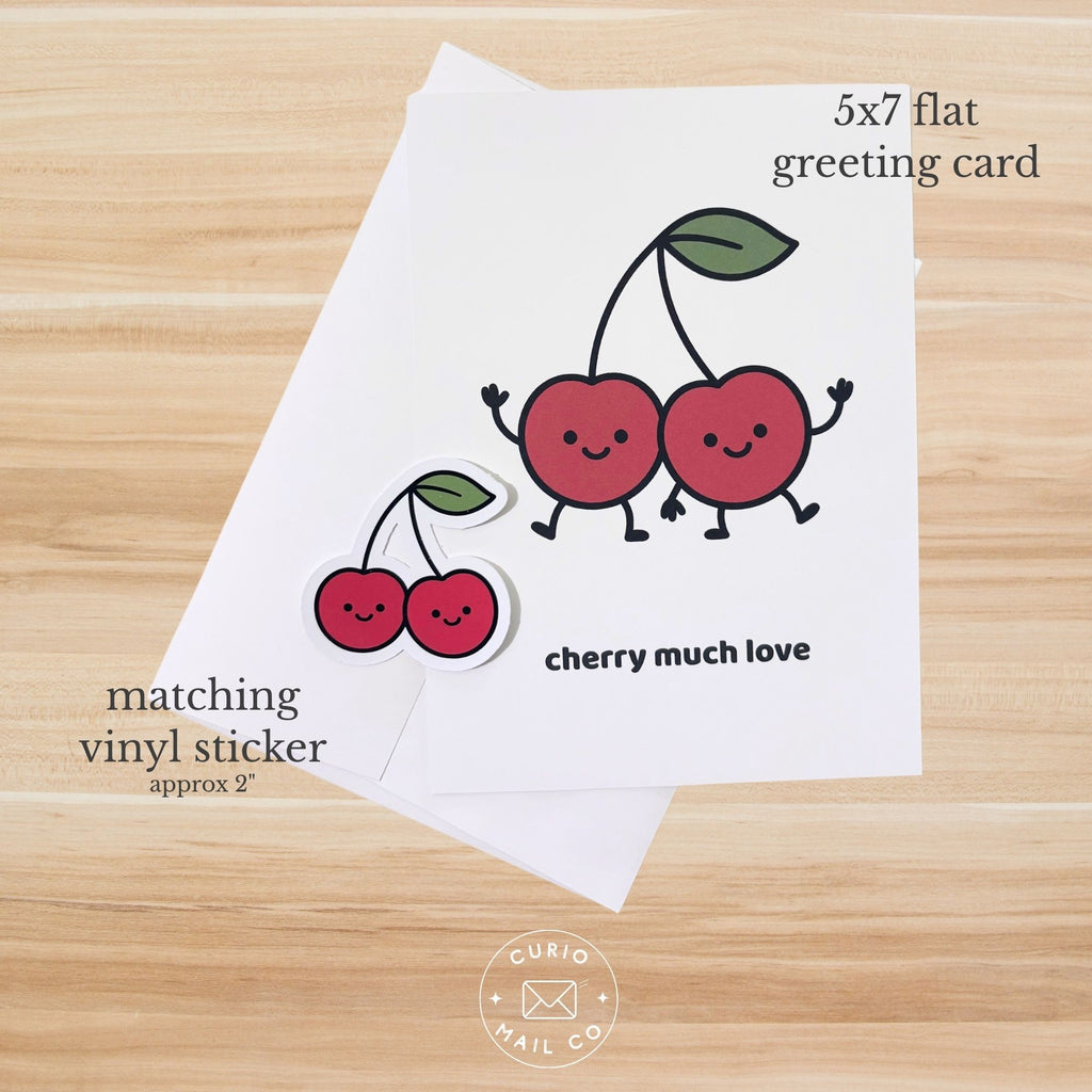 5x7 flat greeting card with cherry design on a wooden surface, featuring matching vinyl sticker.