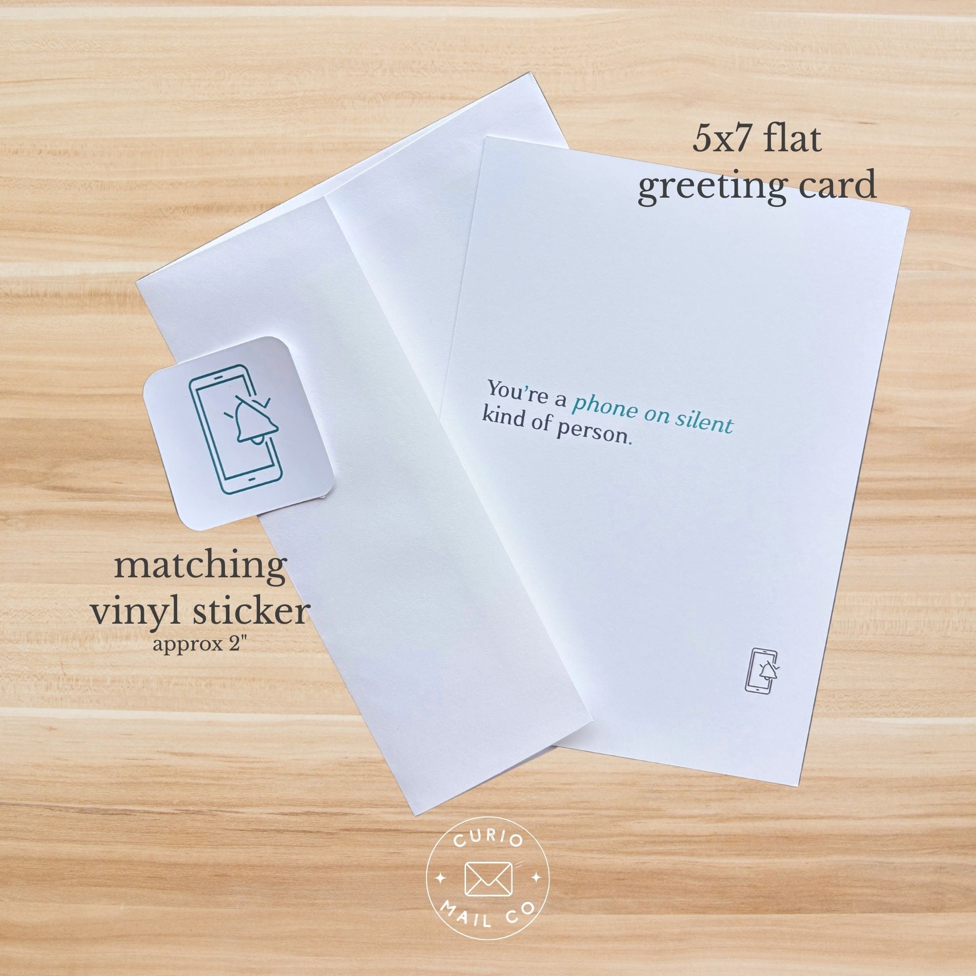 5x7 flat greeting card and matching vinyl sticker on a wooden surface with 'Curio Mail Co' branding.