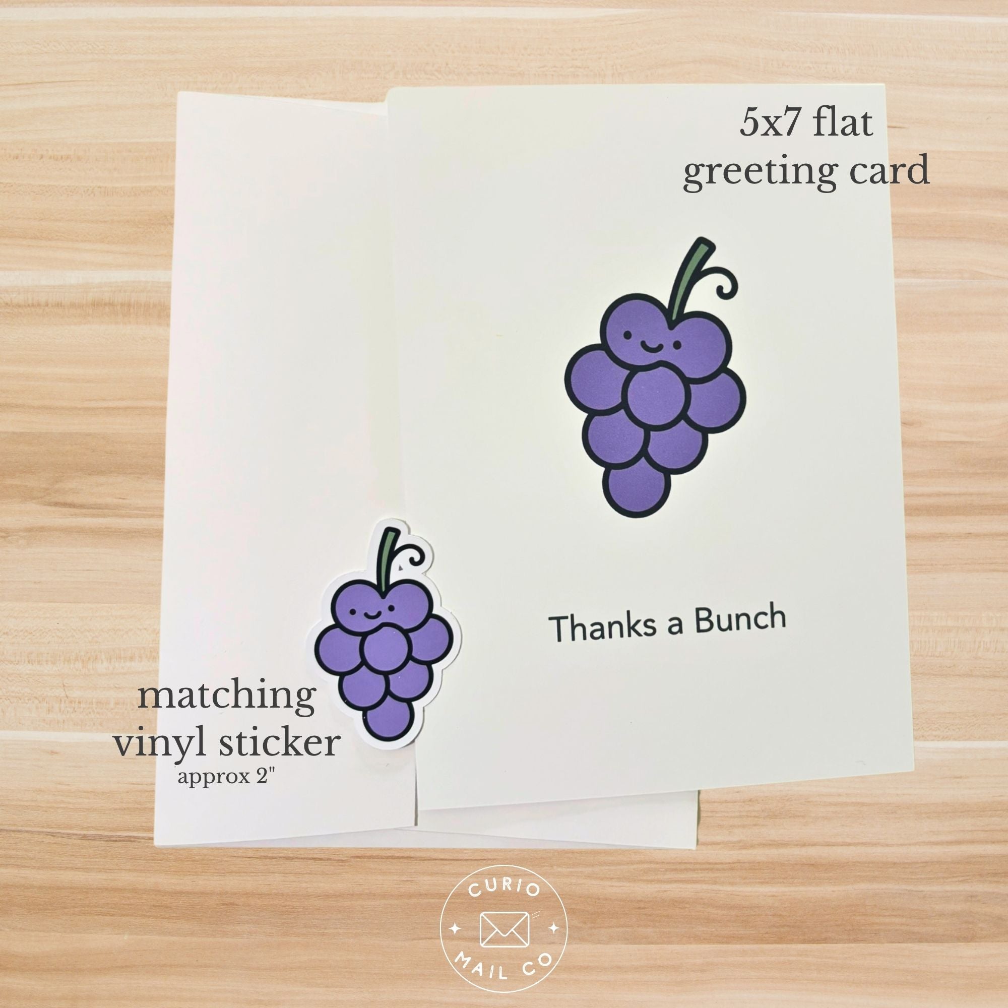 5x7 flat greeting card with grapes
design on a wooden surface, featuring 'Curio Mail Co' branding.