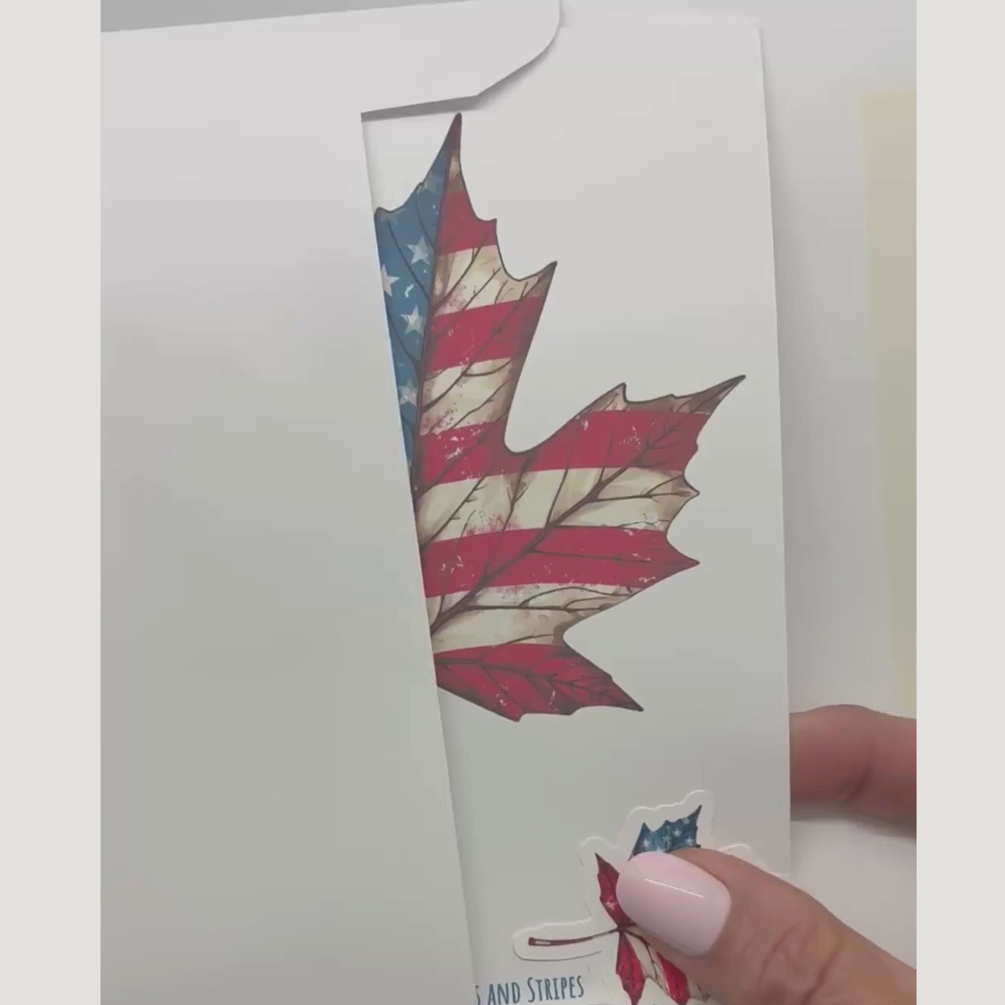 video showing the patriotic card and sticker being removed from an envelope