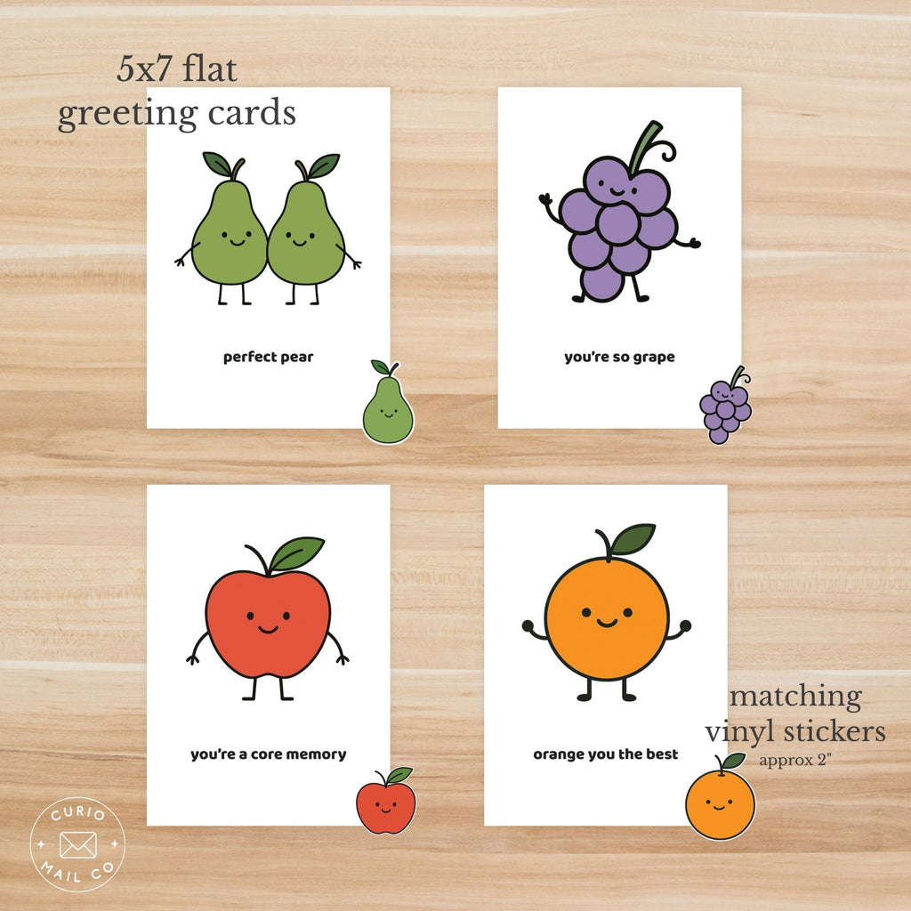 Set of 5x7 flat greeting cards with fruit-themed designs on a wooden surface.