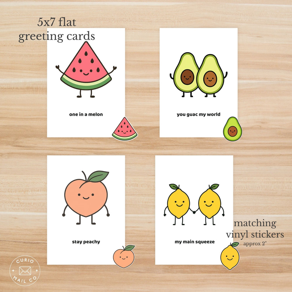 Set of 5x7 flat greeting cards with fruit-themed designs on a wooden surface.
