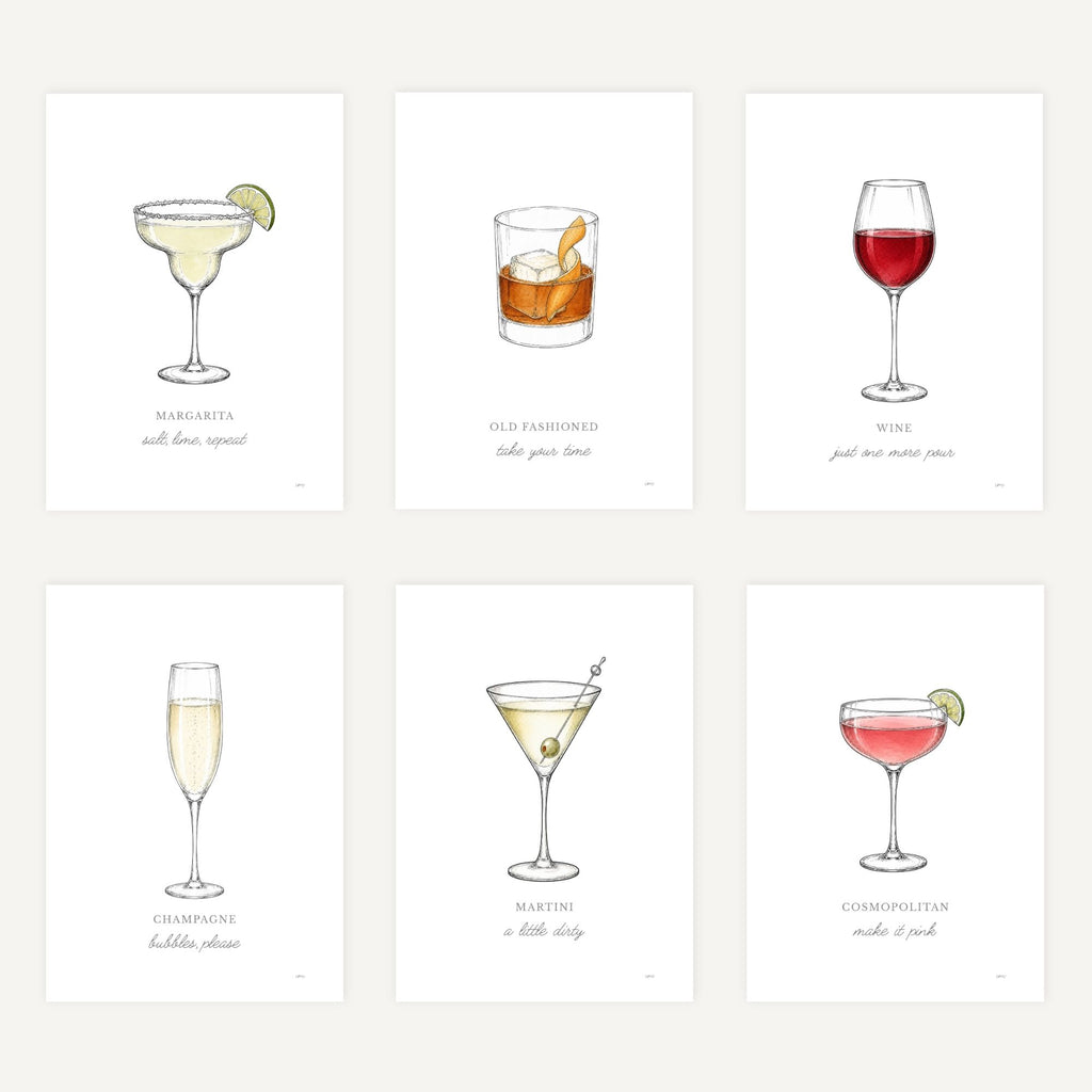 Six illustrated cocktail and drink art prints arranged in a 2x3 grid on a light beige background. The prints show beverage illustrations with labels: margarita, old fashioned, wine, champagne, martini, and cosmopolitan.