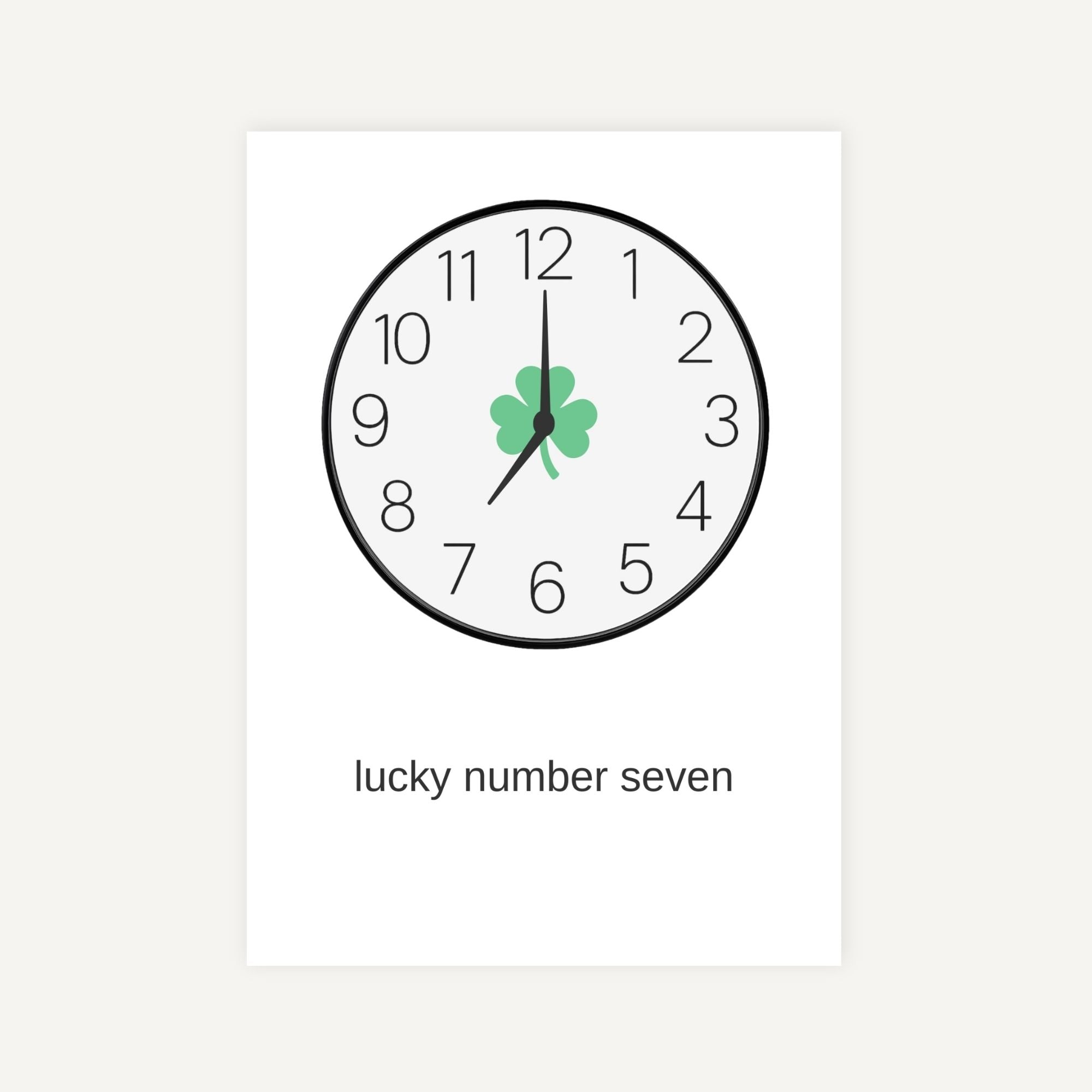 Clock with a clover leaf at the number seven position on a white background