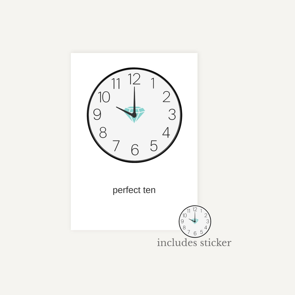 Wall clock with diamond design on face, labeled 'perfect ten' including a sticker.