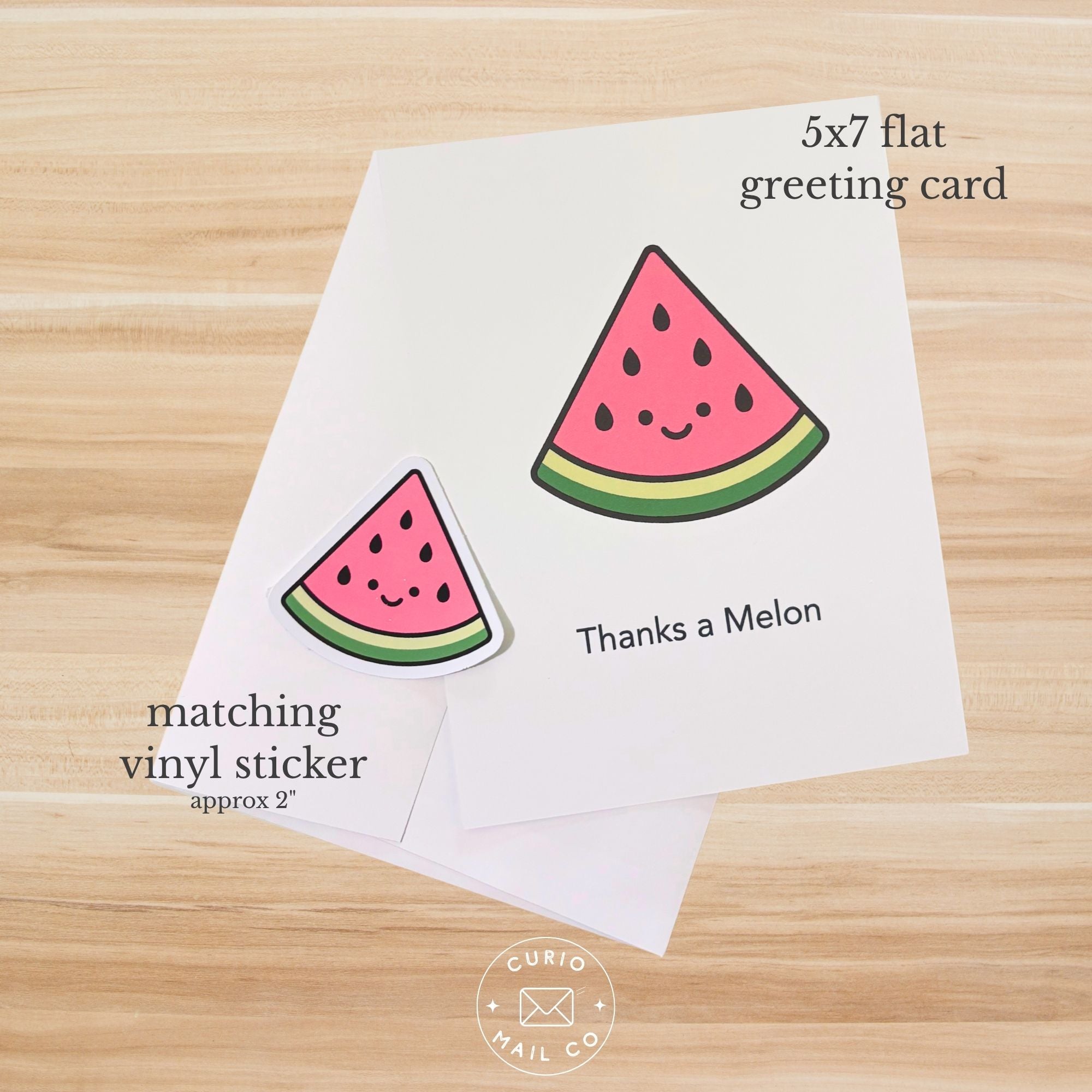 5x7 flat greeting card with watermelon design on a wooden surface, featuring 'Curio Mail Co' branding.